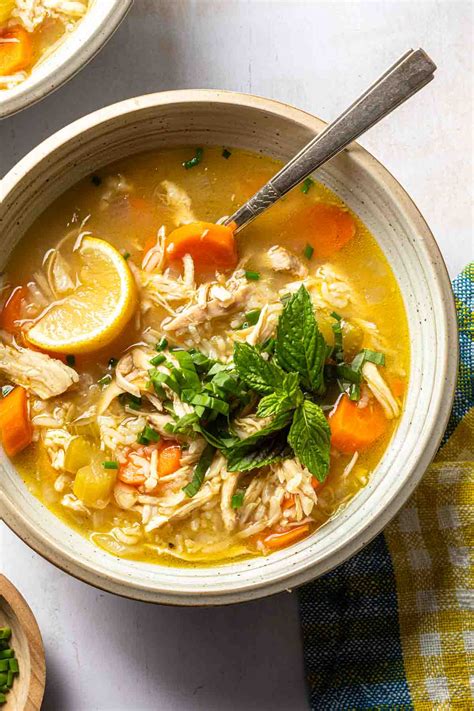 Photo of chicken soup with ginger and rice noodles
