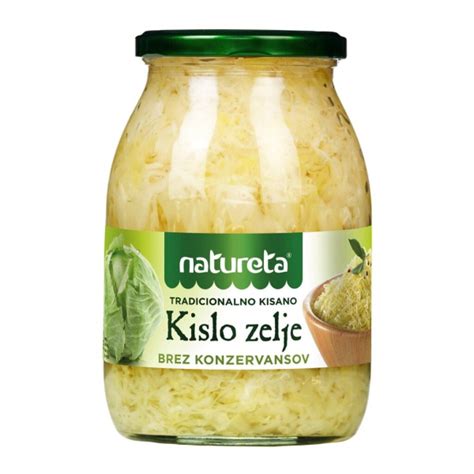 Tematska fotografija: domače kislo zelje v kozarcu ali tradicionalnem loncu