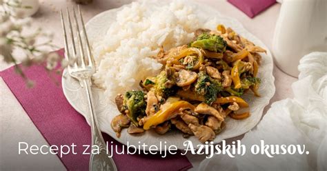 Piščančji stir-fry z riževimi rezanci in svežo zelenjavo v voku