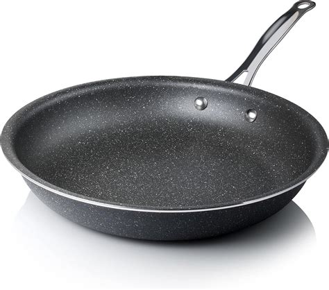 Thematic photo of a Banquet wok pan with a granite non-stick coating on a stove