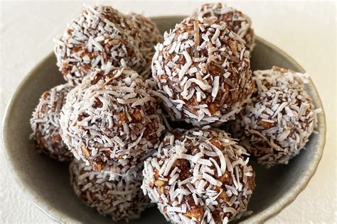 Thematic photo of various no-bake balls on a platter, including chocolate and coconut variations