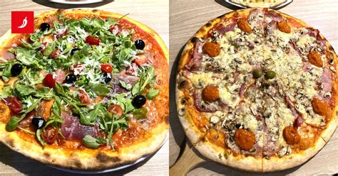 Fotografija sveže pečene pizze v pizzeriji