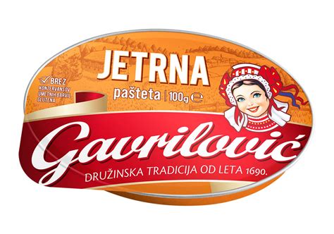 Tematska fotografija: Kremasta jetrna pašteta na opečenem kruhku, okrašena z zelišči.