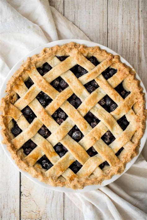 Close-up photo of a blueberry pie with a lattice top