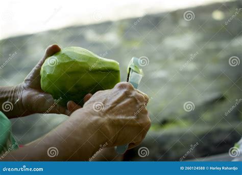Close-up photo of chayote peeling