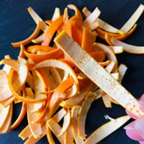 Close-up photo of thinly sliced orange peel strips