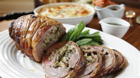 Photo of a stuffed and rolled lamb shoulder, ready to be served.