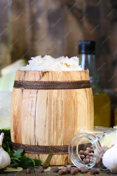 Thematic photo of fresh beans and sauerkraut on a wooden table